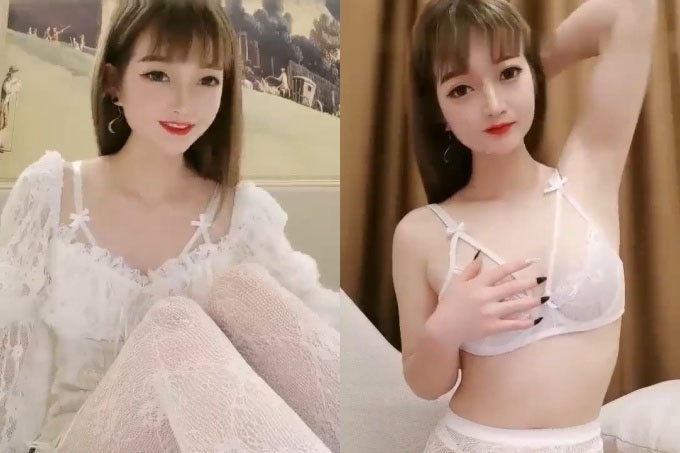 19岁性感红唇白皙美乳妹子 白色清纯蕾丝情趣衣 镜头前扭腰摆臀极度诱惑